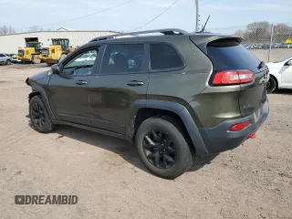2015 Jeep Cherokee Trailhawk with VIN 1C4PJMBSXFW687205, listed as a Copart auction lot 53128545 with 86,876 mi miles and Salvage Title. Bid and sale history available at carsss.com. Image 2.