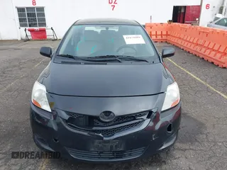 2008 Toyota Yaris with VIN JTDBT903284012329, listed as a IAAI auction lot 41879489 with 117,041 mi miles. Bid and sale history available at carsss.com. Image 12.
