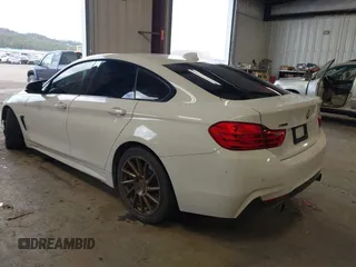 2015 BMW 4 Series 435i xDrive z VIN WBA4B3C53FD669771, wystawiony jako IAAI lot #41835401 z przebiegiem 145 570 mil mil oraz . Historia ofert i sprzedaży dostępna na DreamBid. Obrazek 3.