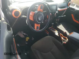 2014 Jeep Wrangler Unlimited Rubicon with VIN 1C4BJWFG4EL325544, listed as a Copart auction lot 61966025 with 149,162 mi miles and Salvage title. Bid and sale history available at DreamBid. Image 8.