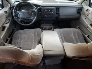 2001 Dodge Dakota z VIN 1B7GG2AX11S108005, wystawiony jako Copart lot #87124934 z przebiegiem 248 482 mil mil oraz Czysty tytuł • Clean title. Historia ofert i sprzedaży dostępna na DreamBid. Obrazek 8.