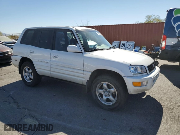 2000 Toyota RAV4 with VIN JT3HP10V0Y7164016, listed as a Copart auction lot 72999754 with 215,880 mi miles and Salvage Title. Bid and sale history available at carsss.com. Image 4.