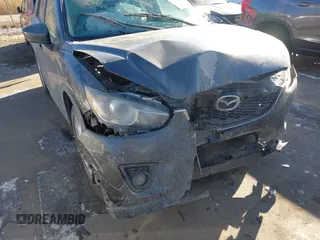 2014 Mazda CX-5 Grand Touring with VIN JM3KE2DY1E0421326, listed as a IAAI auction lot 41330794 with 127,589 mi miles. Bid and sale history available at carsss.com. Image 6.