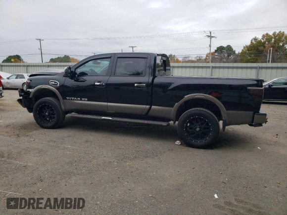 2017 Nissan Titan XD SL with VIN 1N6AA1F41HN548361, listed as a Copart auction lot 84654174 with 142,057 mi miles and Salvage Title. Bid and sale history available at carsss.com. Image 2.