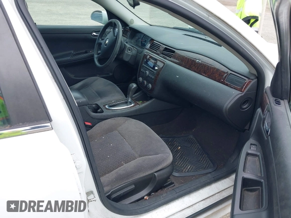 2015 Chevrolet Impala LS with VIN 2G1WA5E36F1163958, listed as a IAAI auction lot 42322814 with 154,683 mi miles and . Bid and sale history available at DreamBid. Image 5.