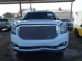 2019 GMC Yukon SLT with VIN 1GKS2BKC5KR109529, listed as a IAAI auction lot 41559860 with 136,025 mi miles. Bid and sale history available at carsss.com. Image 13.