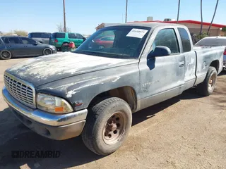 1997 Dodge Dakota z VIN 1B7GL23Y0VS153508, wystawiony jako IAAI lot #41610079 z przebiegiem 266 645 mil mil oraz . Historia ofert i sprzedaży dostępna na DreamBid. Obrazek 17.