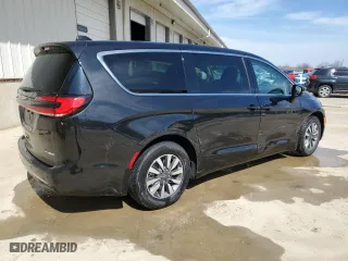 2023 Chrysler Pacifica Hybrid Touring L with VIN 2C4RC1L74PR631346, listed as a Copart auction lot 48480975 with 50,937 mi miles and Clean Title. Bid and sale history available at carsss.com. Image 3.