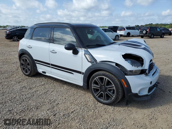 2014 MINI Countryman S with VIN WMWZC3C53EWP52333, listed as a Copart auction lot 54418495 with 34,687 mi miles and Salvage Title. Bid and sale history available at DreamBid. Image 4.