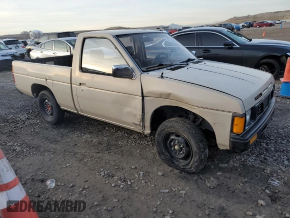 1986 Nissan Hardbody E z VIN JN6ND11S1GW037479, wystawiony jako Copart lot #81775934 z przebiegiem 389 841 mil mil oraz Szkoda całkowita • Salvage title. Historia ofert i sprzedaży dostępna na DreamBid. Obrazek 4.