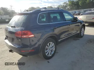 2014 Volkswagen Touareg Sport with VIN WVGEF9BP0ED005648, listed as a Copart auction lot 53230315 with 188,103 mi miles and Clean Title. Bid and sale history available at DreamBid. Image 3.