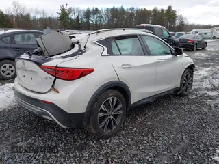 2017 Infiniti QX30 Premium with VIN SJKCH5CR5HA030269, listed as a IAAI auction lot 40977881 with 54,891 mi miles and . Bid and sale history available at DreamBid. Image 4.