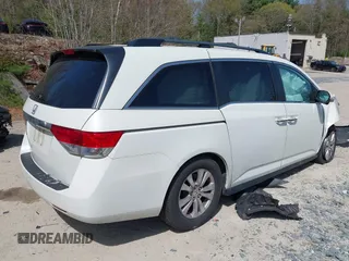 2014 Honda Odyssey EX with VIN 5FNRL5H47EB016885, listed as a IAAI auction lot 42136365 with 100,189 mi miles and . Bid and sale history available at carsss.com. Image 4.