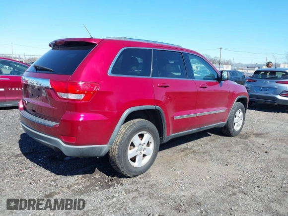 2012 Jeep Grand Cherokee Laredo with VIN 1C4RJFAG7CC297757, listed as a IAAI auction lot 41901645 with 270,731 mi miles. Bid and sale history available at carsss.com. Image 4.