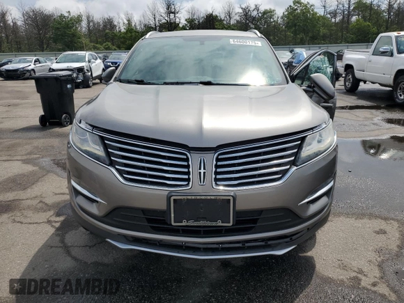 2017 Lincoln MKC Select z VIN 5LMCJ2D9XHUL46567, wystawiony jako Copart lot #64600175 z przebiegiem 65 089 mil mil oraz Szkoda całkowita • Salvage title. Historia ofert i sprzedaży dostępna na DreamBid. Obrazek 5.