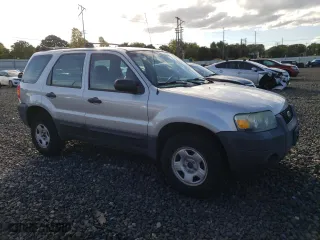 2007 Ford Escape XLS with VIN 1FMYU92Z97KA43155, listed as a Copart auction lot 75567154 with 240,603 mi miles and Salvage Title. Bid and sale history available at carsss.com. Image 4.