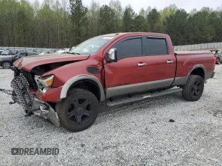 2017 Nissan Titan Platinum Reserve z VIN 1N6AA1F46HN526825, wystawiony jako Copart lot #51489275 z przebiegiem 117 455 mil mil oraz Szkoda całkowita • Salvage title. Historia ofert i sprzedaży dostępna na DreamBid. Obrazek 1.