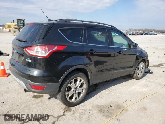 2013 Ford Escape SE with VIN 1FMCU0GX2DUB77759, listed as a Copart auction lot 42611795 with 165,485 mi miles and Salvage Title. Bid and sale history available at DreamBid. Image 3.