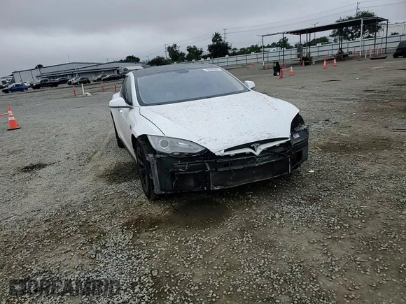 2014 Tesla Model S 60 с VIN 5YJSA1H19EFP52457, выставлен на аукционе Copart как лот 59589905 с пробегом 167 662 миль миль и Списание • Salvage title. История ставок и продаж доступна на DreamBid. Изображение 14.