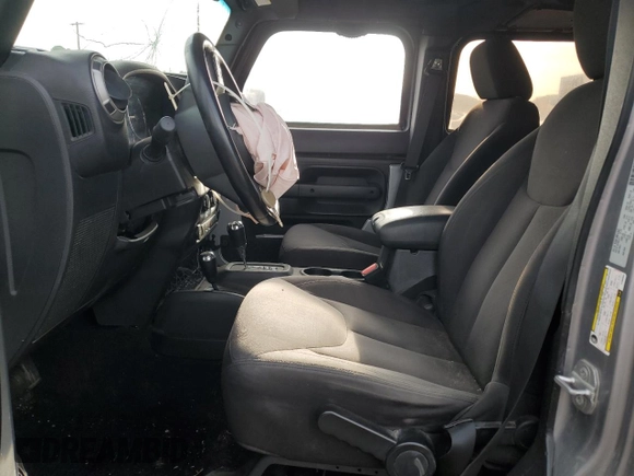 2015 Jeep Wrangler Unlimited Willys Wheeler with VIN 1C4BJWDG7FL690952, listed as a Copart auction lot 51493715 with 45,497 mi miles and Salvage Title. Bid and sale history available at DreamBid. Image 7.