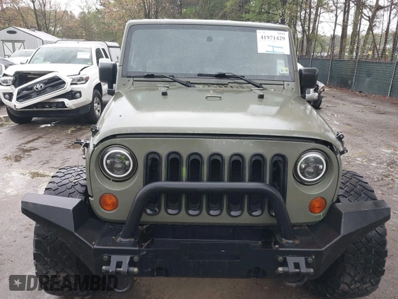 2007 Jeep Wrangler X with VIN 1J4FA24127L231409, listed as a IAAI auction lot 41971429 with 181,855 mi miles and . Bid and sale history available at carsss.com. Image 6.