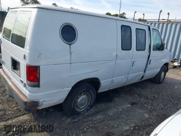 2002 Ford Econoline Cargo with VIN 1FTRE14262HB84357, listed as a IAAI auction lot 40880551 with 123,183 mi miles. Bid and sale history available at carsss.com. Image 4.