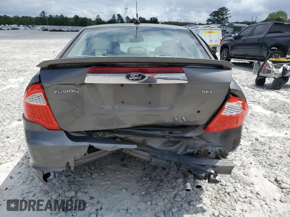 2012 Ford Fusion SEL z VIN 3FAHP0JA4CR371923, wystawiony jako Copart lot #55132125 z przebiegiem 135 390 mil mil oraz Szkody całkowita. Historia ofert i sprzedaży dostępna na DreamBid. Obrazek 6.