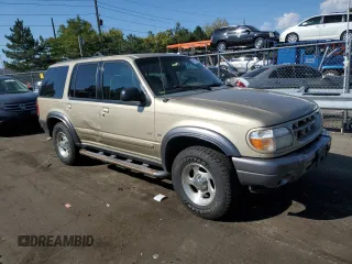 2000 Ford Explorer XLT z VIN 1FMDU83P1YZC26628, wystawiony jako Copart lot #69201664 z przebiegiem 219 384 mil mil oraz Nie do naprawy • Non repairable. Historia ofert i sprzedaży dostępna na DreamBid. Obrazek 4.