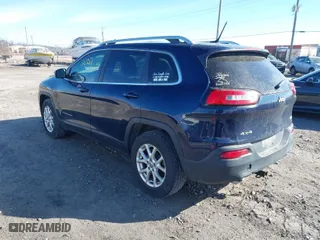 2014 Jeep Cherokee Latitude with VIN 1C4PJMCS6EW145810, listed as a IAAI auction lot 41802031 with 143,358 mi miles. Bid and sale history available at carsss.com. Image 3.