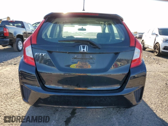 2016 Honda Fit LX with VIN 3HGGK5H56GM704864, listed as a Copart auction lot 75690264 with 54,543 mi miles and Salvage title. Bid and sale history available at DreamBid. Image 6.