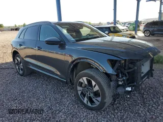 2023 Audi e-tron Premium with VIN WA1AAAGE3PB023323, listed as a Copart auction lot 69809524 with 31,564 mi miles and Salvage Title. Bid and sale history available at DreamBid. Image 4.