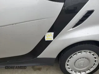 2015 Smart fortwo Passion z VIN WMEEJ3BA8FK801168, wystawiony jako Copart lot #74599144 z przebiegiem Nie podano mil oraz Nie do naprawy • Non repairable. Historia ofert i sprzedaży dostępna na DreamBid. Obrazek 12.