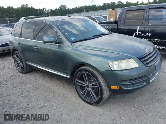 2004 Volkswagen Touareg z VIN WVGCM77L24D061029, wystawiony jako IAAI lot #42196634 z przebiegiem 221 240 mil mil oraz . Historia ofert i sprzedaży dostępna na DreamBid. Obrazek 1.