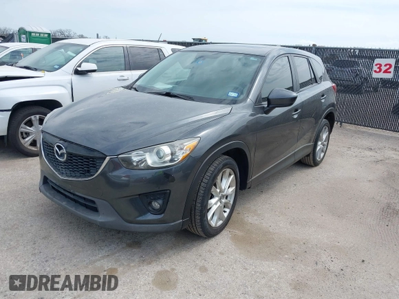 2014 Mazda CX-5 Grand Touring with VIN JM3KE2DY0E0354220, listed as a IAAI auction lot 41885502 with 168,901 mi miles. Bid and sale history available at carsss.com. Image 17.
