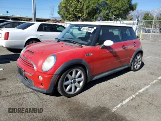 2002 MINI Hardtop S with VIN WMWRE33462TD57600, listed as a Copart auction lot 80396904 with 124,238 mi miles and Salvage Title. Bid and sale history available at DreamBid. Image 1.