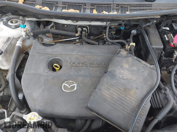 2012 Mazda 5 Sport with VIN JM1CW2BLXC0114770, listed as a IAAI auction lot 42147656 with 99,908 mi miles and . Bid and sale history available at DreamBid. Image 10.