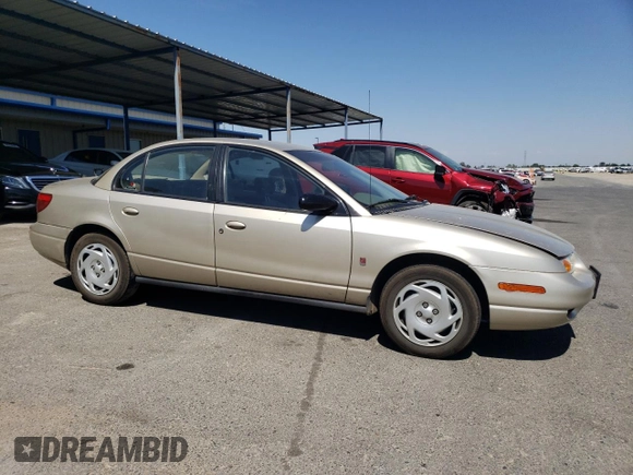 2000 Saturn SL with VIN 1G8ZK5274YZ103237, listed as a Copart auction lot 60558105 with 126,320 mi miles and Salvage title. Bid and sale history available at DreamBid. Image 4.