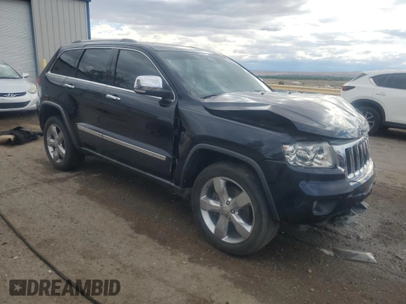 2011 Jeep Grand Cherokee Limited with VIN 1J4RR5GT0BC523363, listed as a Copart auction lot 55468005 with 127,934 mi miles and Salvage title. Bid and sale history available at DreamBid. Image 4.