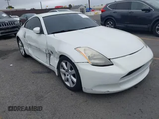 2004 Nissan 350Z Enthusiast z VIN JN1AZ34D04T153025, wystawiony jako IAAI lot #42192315 z przebiegiem 117 525 mil mil oraz . Historia ofert i sprzedaży dostępna na DreamBid. Obrazek 1.