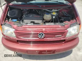1999 Volkswagen EuroVan с VIN WV2MH2703XH045037, выставлен на аукционе Copart как лот 57109265 с пробегом 265 855 миль миль и Списание • Salvage title. История ставок и продаж доступна на DreamBid. Изображение 12.