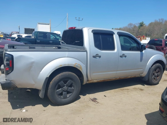 2011 Nissan Frontier PRO-4X with VIN 1N6AD0EVXBC407089, listed as a IAAI auction lot 42113537 with 124,853 mi miles. Bid and sale history available at carsss.com. Image 13.