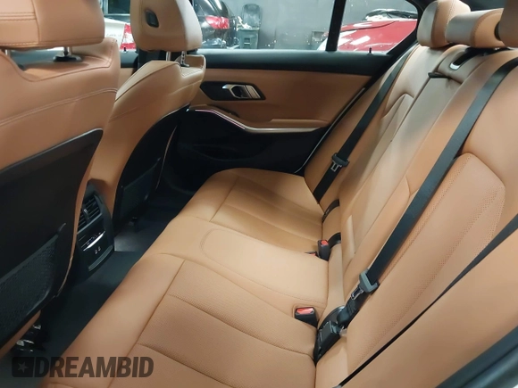 2023 BMW 3 Series 330e xDrive with VIN 3MW39FS05P8D20575, listed as a IAAI auction lot 42076033 with 10,875 mi miles. Bid and sale history available at carsss.com. Image 8.