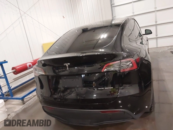 2021 Tesla Model Y Long Range with VIN 5YJYGAEE5MF305655, listed as a IAAI auction lot 41860993 with 50,750 mi miles. Bid and sale history available at carsss.com. Image 16.