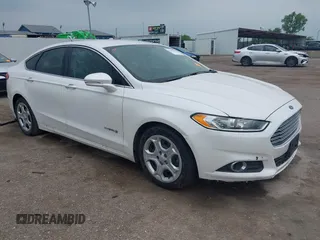 2015 Ford Fusion SE Hybrid with VIN 3FA6P0LU8FR160047, listed as a IAAI auction lot 42307065 with 210,983 mi miles and . Bid and sale history available at DreamBid. Image 1.