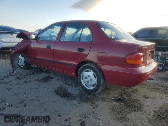 1997 Hyundai Accent z VIN KMHVF24N9VU356190, wystawiony jako Copart lot #85610774 z przebiegiem 91 707 mil mil oraz Tytuł czysty. Historia ofert i sprzedaży dostępna na DreamBid. Obrazek 2.