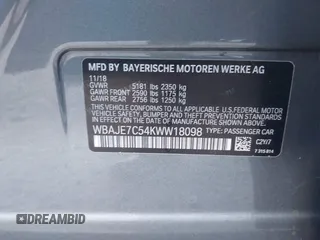 2019 BMW 5 Series 540i xDrive with VIN WBAJE7C54KWW18098, listed as a IAAI auction lot 41412017 with 59,235 mi miles and . Bid and sale history available at carsss.com. Image 9.