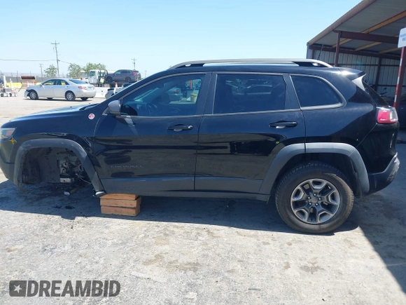 2019 Jeep Cherokee Trailhawk Elite with VIN 1C4PJMBX0KD198328, listed as a IAAI auction lot 42085194 with 76,312 mi miles and . Bid and sale history available at DreamBid. Image 15.