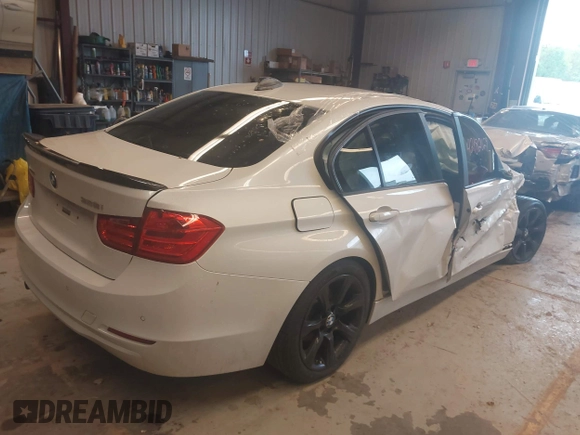 2015 BMW 3 Series 328i xDrive with VIN WBA3B3G5XFNR87824, listed as a IAAI auction lot 42182029 with 70,000 mi miles and . Bid and sale history available at DreamBid. Image 4.