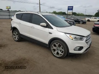 2019 Ford Escape Titanium with VIN 1FMCU0J91KUB19987, listed as a Copart auction lot 53946025 with 90,092 mi miles and Salvage title. Bid and sale history available at DreamBid. Image 4.