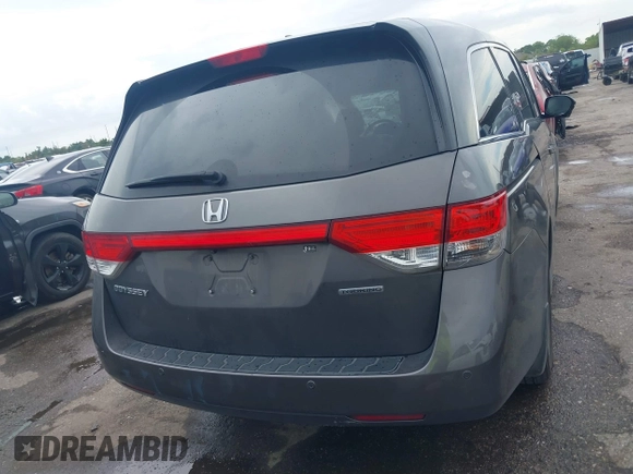 2016 Honda Odyssey Touring Elite with VIN 5FNRL5H97GB010048, listed as a IAAI auction lot 40212711 with 119,009 mi miles and . Bid and sale history available at DreamBid. Image 16.